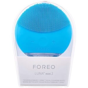 Blue FOREO LUNA mini 2 silicone facial cleansing device in clear packaging, ready to use for skincare cleansing