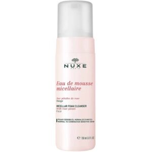 Nuxe Eau de Mousse Micellaire bottle with pink label and silver cap, brand logo visible, skincare cleanser for sensitive skin (150 ml)