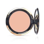 Open round compact powder with beige pressed powder and a gold-black case with mirror reflecting light, on white background.