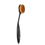 Black curved-handled makeup brush with dense orange-brown bristles (Golden Rose branding).
