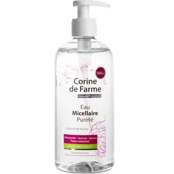 Clear 500 ml bottle of Corine de Farme Eau Micellaire Purité, a facial cleansing water with pink label details visible on the front.
