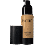 Foundation bottle with pump dispenser and black cap; beige label reads NOTE, SPF 15.