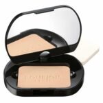 Open makeup compact with mirror, containing beige pressed powder labeled BOURJOIS.