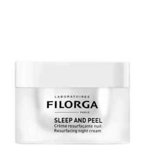 White skincare jar with bold black text reading FILORGA Sleep and Peel, close-up of the container edge.